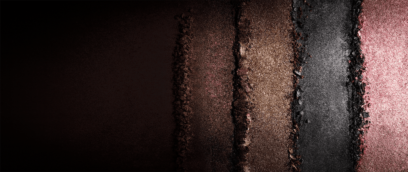 Close-up of a road surface with different textures and colors