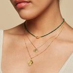 Cradled in Protection Gold Hamsa Necklace